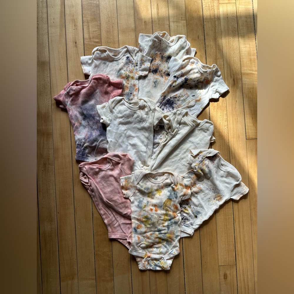 Lot of 9 botanically dyed newborn onesies